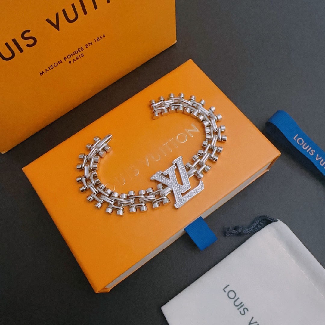 LV bracelet: This full-diamond LV bracelet is a retro, trendy, and fashionable piece suitable for both men and women. It's a matching couple's style, featuring a rock-punk Thai silver design with retro elements. A