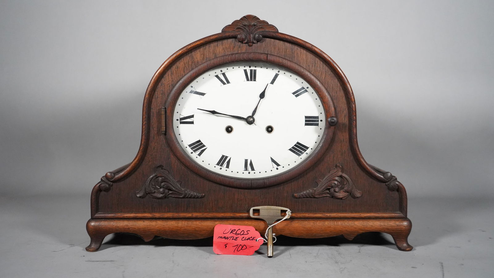 Vintage "Urgos" Art Deco Wooden Mantel Clock with Key: Vintage "Urgos" Art Deco Wooden Mantel Clock with Key #156/40 140. Size: 18"1/4L x 6"1/2W x 13"H.
