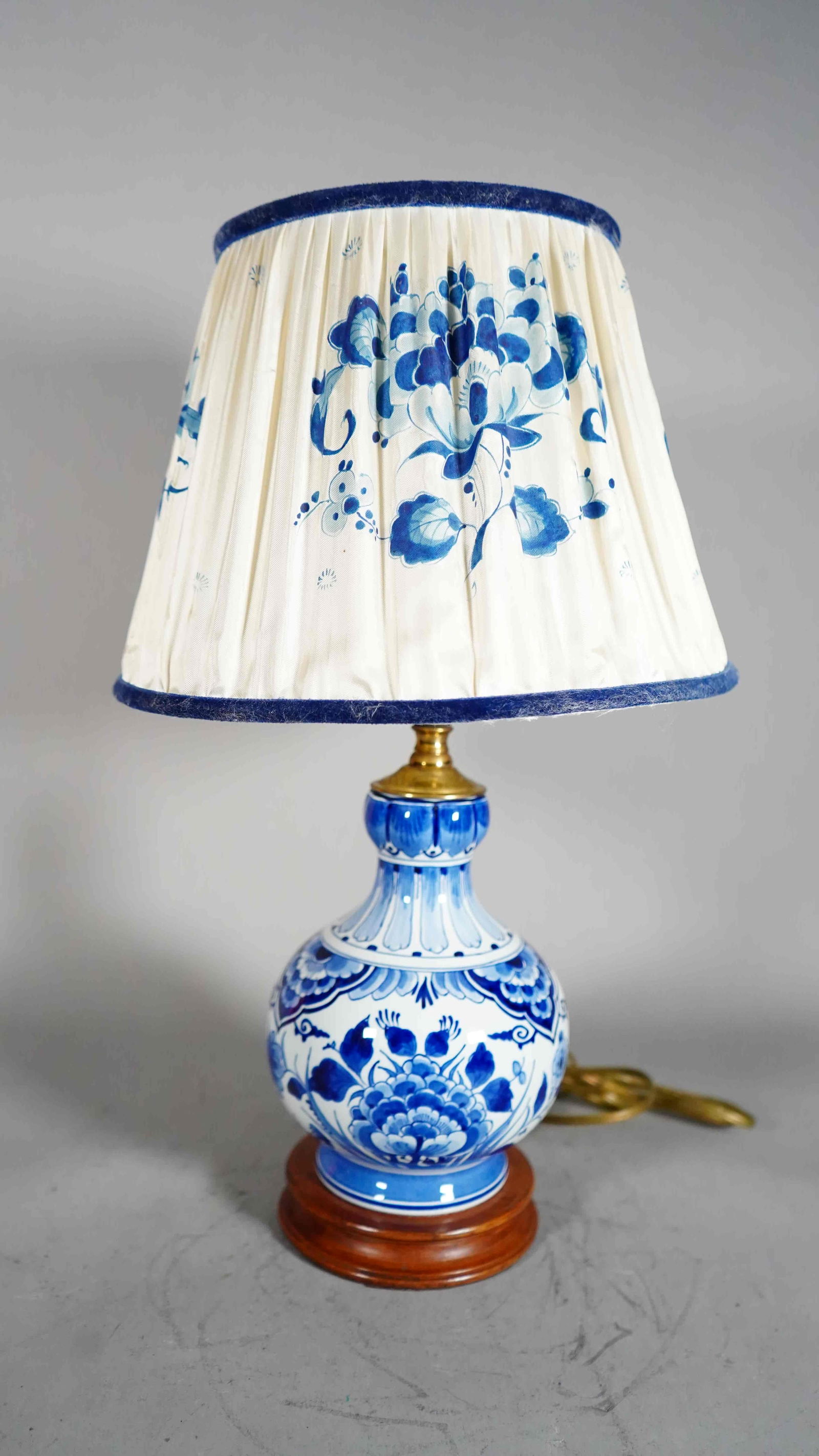 Antique Delft Blue and White Porcelain Vase Mounted as a Table Lamp with Matching Lampshade: Antique Delft Blue and White Porcelain Ceramic Vase Mounted as a Table Lamp, Matching Lampshade and Wooden Base. Lamp Height: 8"1/2, Base Diameter: 5"1/4