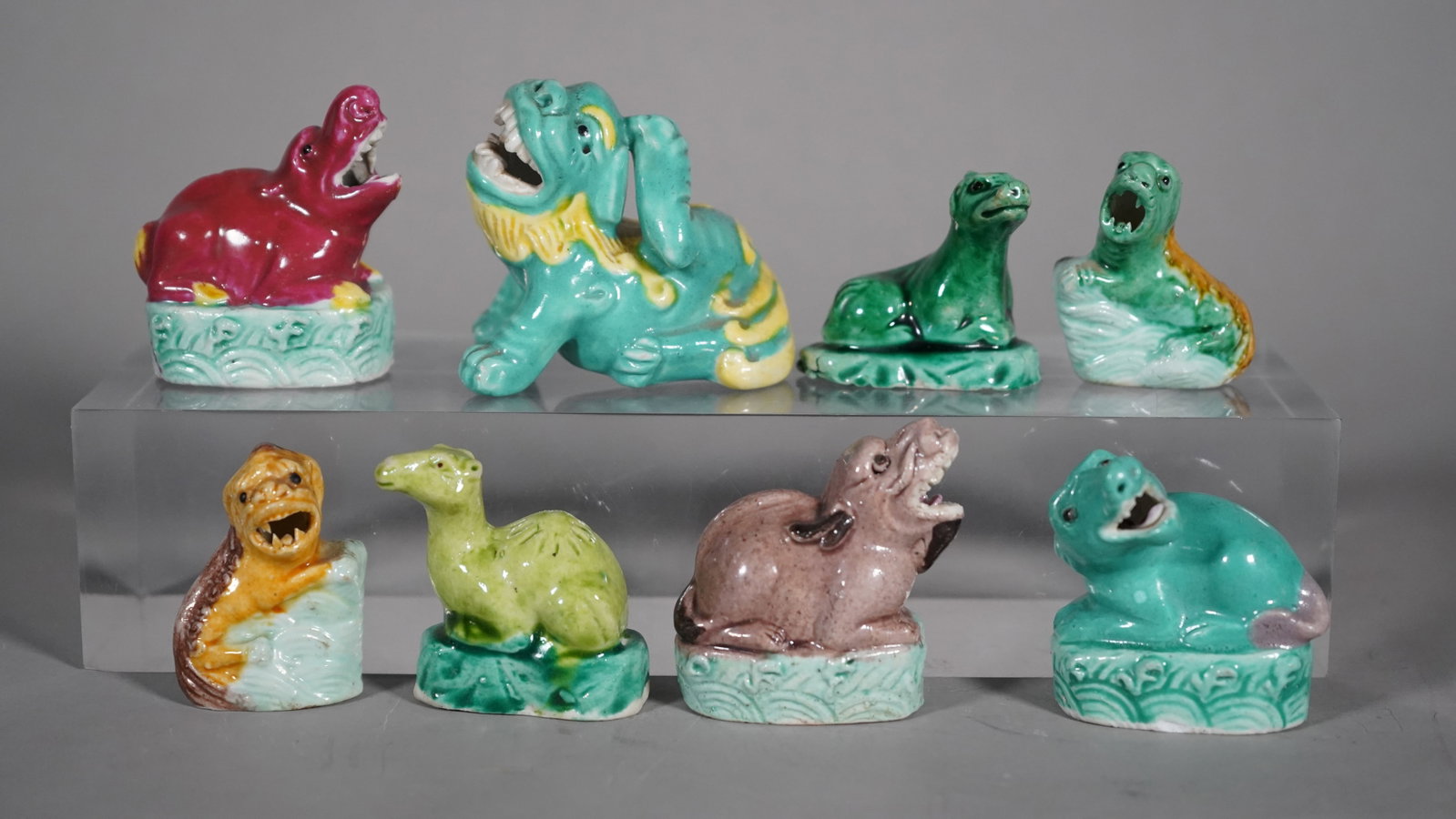 Lot of 8 Vintage Miniature Porcelain Chinese Dragons Statues: Lot of 8 Vintage Miniature Porcelain Chinese Dragons Statues With "CHINA" Marked. Camel, Lion, Foo Dog and Unicorn. Measure approx.: High 1"3/4 to 2"1/2, length 1"1/2 to 2"1/2 , (Stand Not Included)