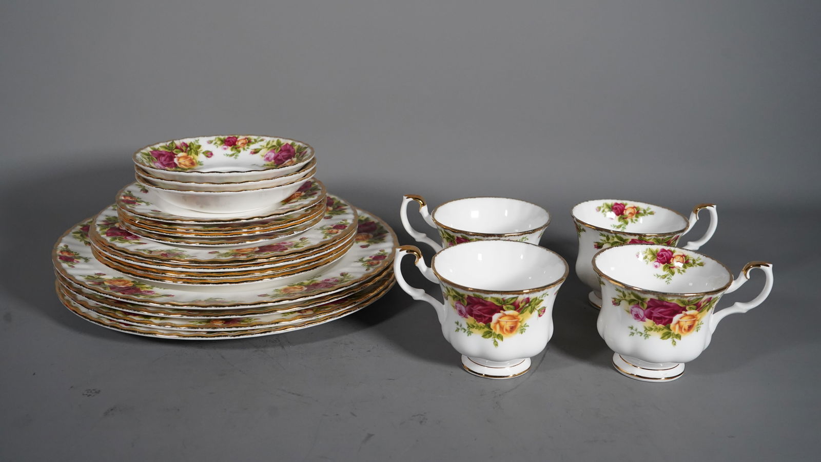 Set of 19 England "Old Country Roses" 1962 Royal Albert Bone China Plates & Cups: Set of 19 England "Old Country Roses" 1962 Royal Albert Bone China Plates & Cups. 3"1/2Dia x 3"H cups (4pcs), 5"1/2Dia saucer (3pcs), 6"1/4Dia plate (4pcs), 8"Dia plate (4pcs), 10"1/2Dia plate (4pcs);