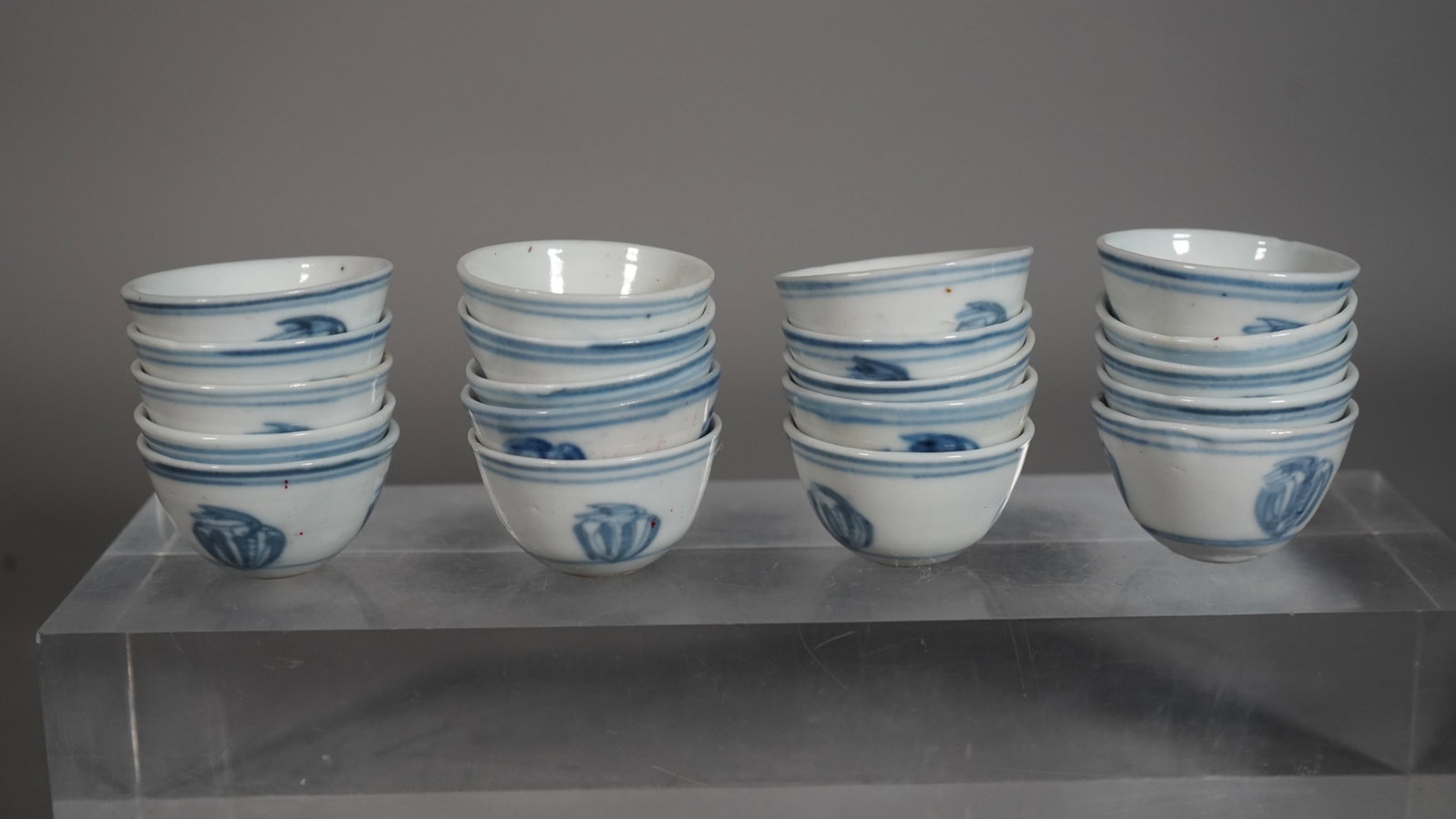 Group of 20 Old Chinese Blue & White Porcelain Mini Rice Wine Cups: Group of 20 Old Chinese Blue & White Porcelain Mini Rice Wine Cups. Measure approx. 1"3/4Dia x 1"H, In very good condition.(Stand Not Included)