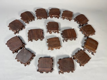 Group of 17 Hand-Carved Dark Hard Wood Display Stands