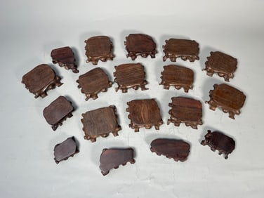 Group of 18 Hand-Carved Dark Hard Wood Display Stands