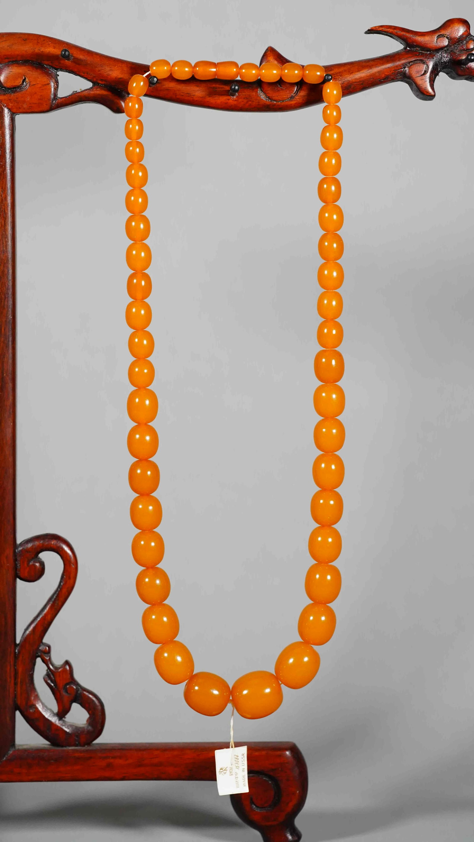 Vintage 47 Gradient Butterscotch Amber with Screw Clasp Necklace, Made in USSR: Vintage 47 Gradient Butterscotch Amber with Screw Clasp Necklace, Made in USSR. Diameter of the central olive 21.2mm x 23.1mm; Weight: 79g, (Stand Not Included)