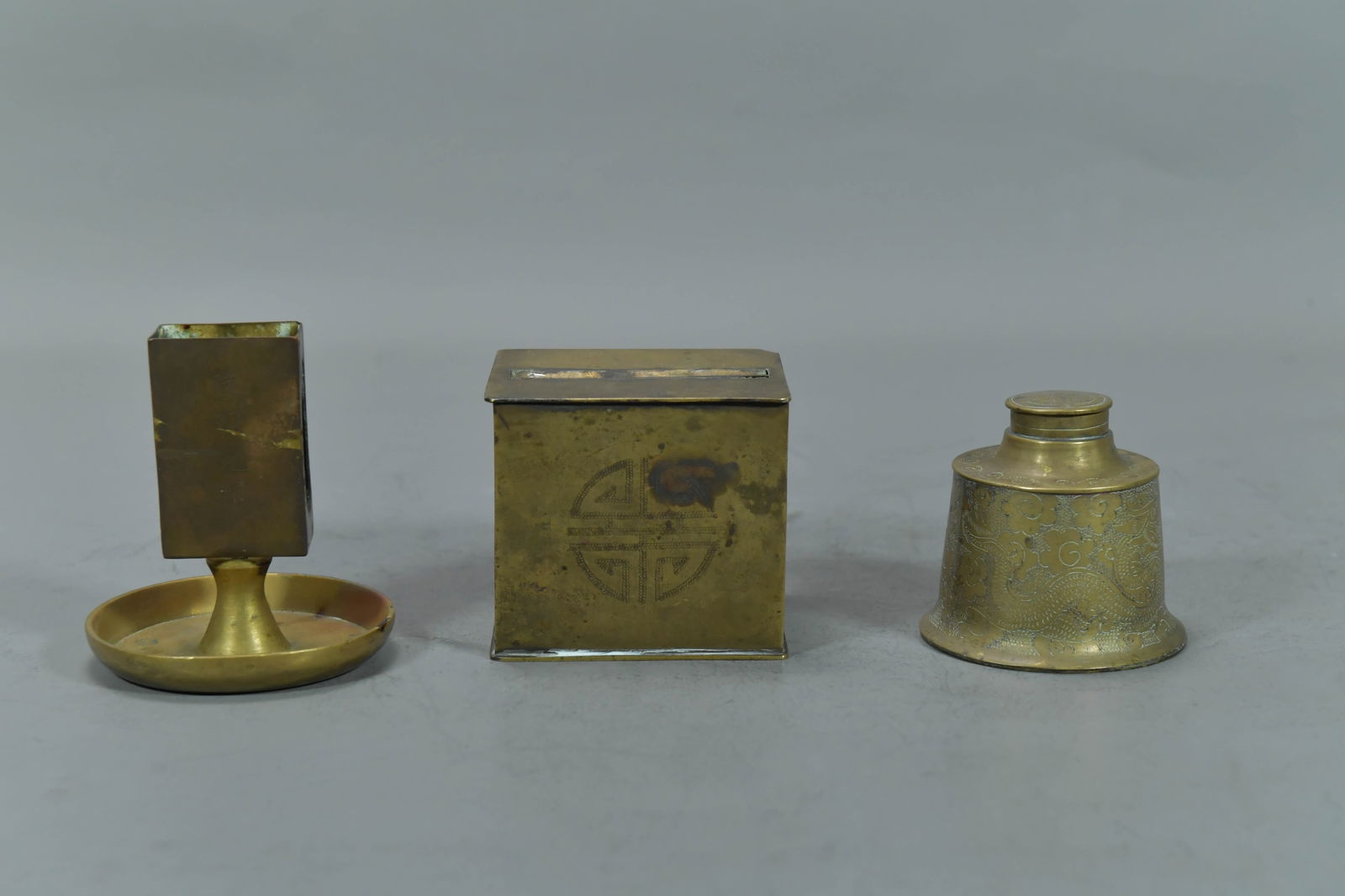 Group of 3 Vintage Chinese Oriental Brass Cigarette Dispenser, Inkwell & Matchbox Holder w/Tray: Vintage Asian Oriental Brass Cigarette Dispenser, Inkwell and Matchbox Holder with Tray. Cigarette dispenser 3"1/4L x 2"1/2W x 3"H; Inkwell 2"3/4H x 3"W; Matchbox holder with tray 3"1/2H x 3"1/4W; In