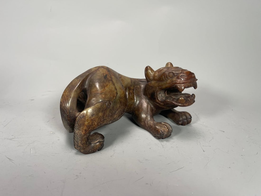 Vintage Chinese Jade Carved Lion Sculpture: Vintage Chinese Jade Carved Lion Sculpture. 8"L x 4"1/2W x 4"H; In good condition, (Stand Not Included)