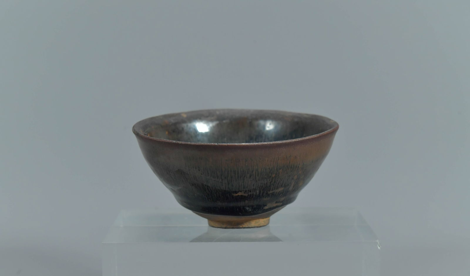 Old Chinese Dark Glazed Tenmoku Ceramic Rice Bowl: Old Chinese Dark Glazed Tenmoku Ceramic Rice Bowl. Size 4"3/4W x 2"1/4H; In good condition, (Stand Not Included)