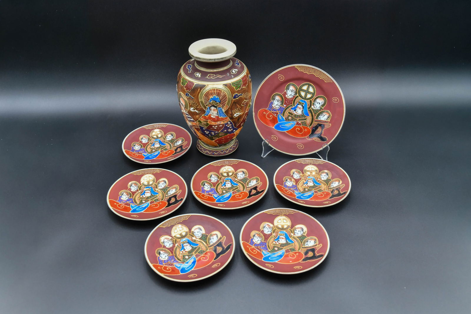 Lot of 8 Vintage Japanese Satsuma Ware Plate & Vase w/Hand-Painted "Goddess & Immortals" Pattern: Lot of 8 Vintage Japanese Satsuma Ware Plate & Vase w/Hand-Painted "Goddess & the Immortals" Pattern, Made in Japan. Diameter 5"3/4 (6pcs) and 7"1/4 (1pcs); Vase tall 9"; In good overall condition.(St