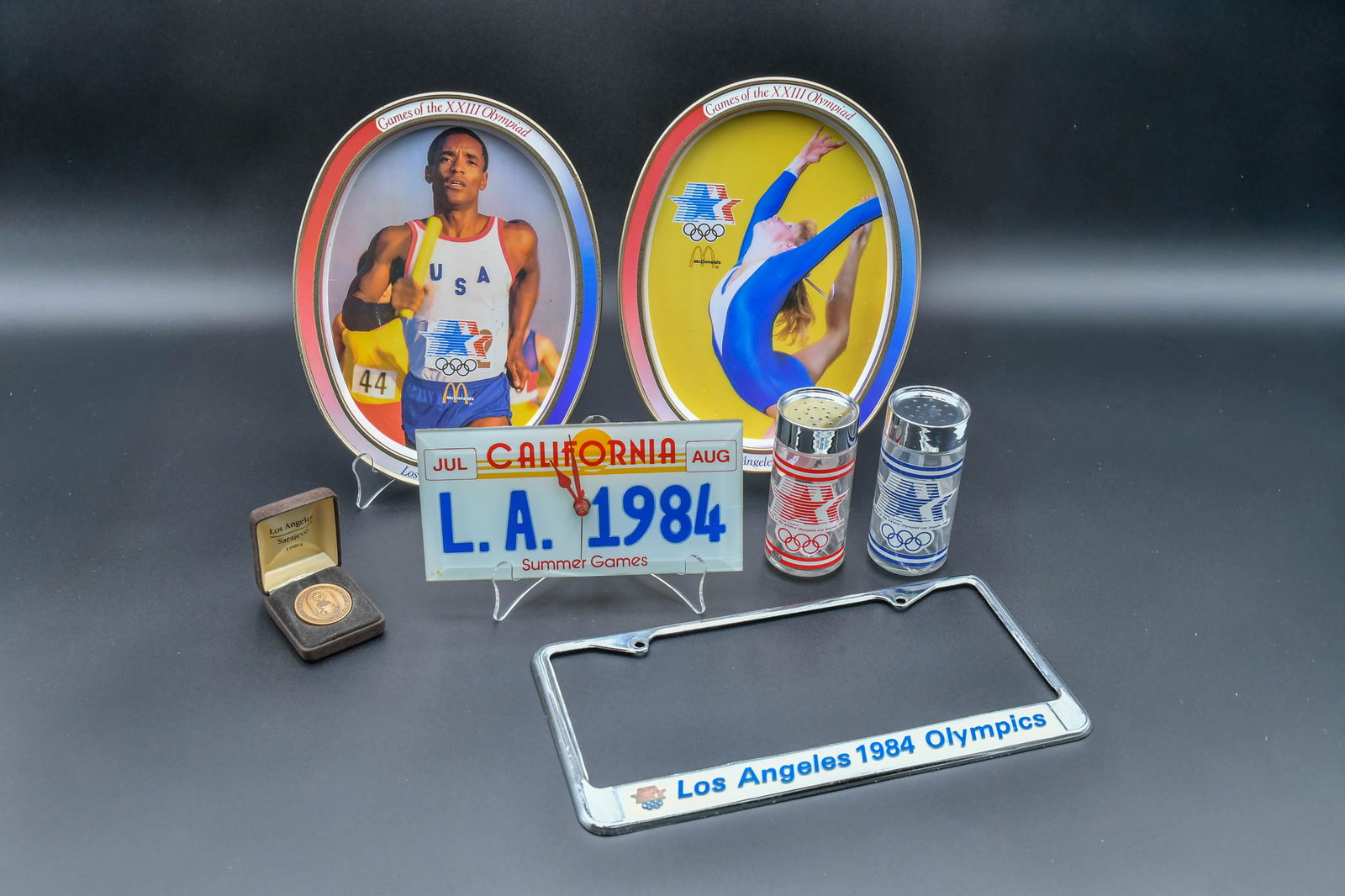 Set of 6 Vintage 1984 Los Angeles Olympics Commemorative Collection: Set of 6 Vintage 1984 Los Angeles Olympics Commemorative Collection. 1)Salt & Pepper Shaker Set w/Mascot "Sam the Eagle", Games of the XXIIIrd Olympiad Los Angeles 1984, The jar features the "Stars in