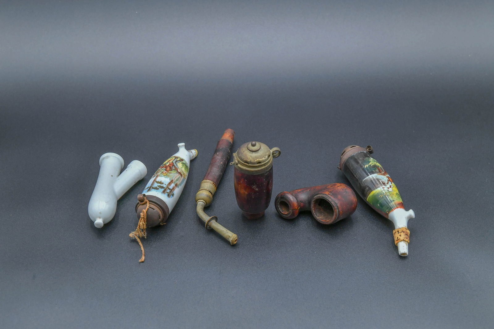 Set of 5 Vintage Pipe Bowl Bases: Set of 5 Vintage Pipe Bowl Bases. 1)Two vintage hand painted porcelain capped pipe bowl base with deer and hunter scene, length 5"1/2; 2)Two vintage wood pipe bowl base, length 3"1/2; 3)A vintage whit