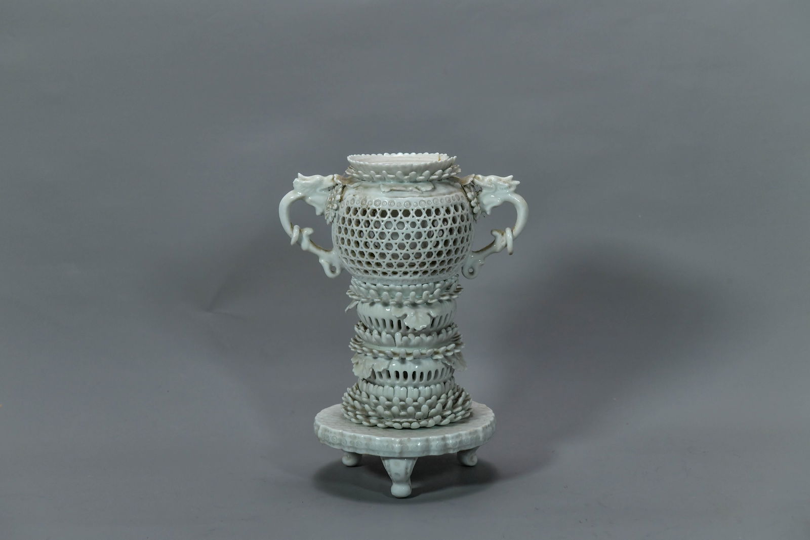Antique Japanese Hirado Blanc de Chine Porcelain Censer, Signed on Underside: Antique Japanese Hirado Reticulated Covered Blanc de Chine Porcelain Censer Incense Burner, Signed on Underside. The top of rings of lotus petals at rim, dragon handles, more lotus leaf rings at botto