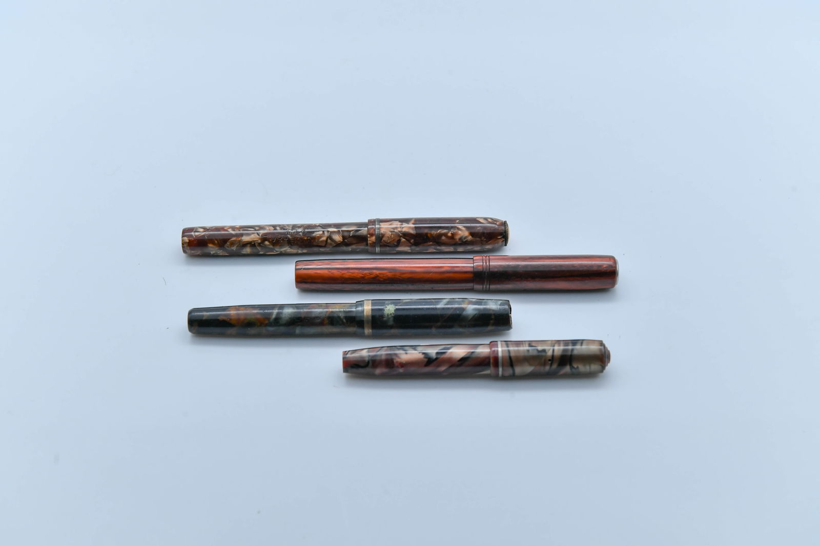 Set of 4 Vintage American Fountain Pens: Set of 4 Vintage American Fountain Pens. 1)Esterbrook 2556 fountain pen 4"3/4length; 2)UNIVERSAL fountain pen 4"3/4length; 3)INKOGRAPH Trade Mark Reg. (The PAT numbers are blurry and illegible) 4"3/4l