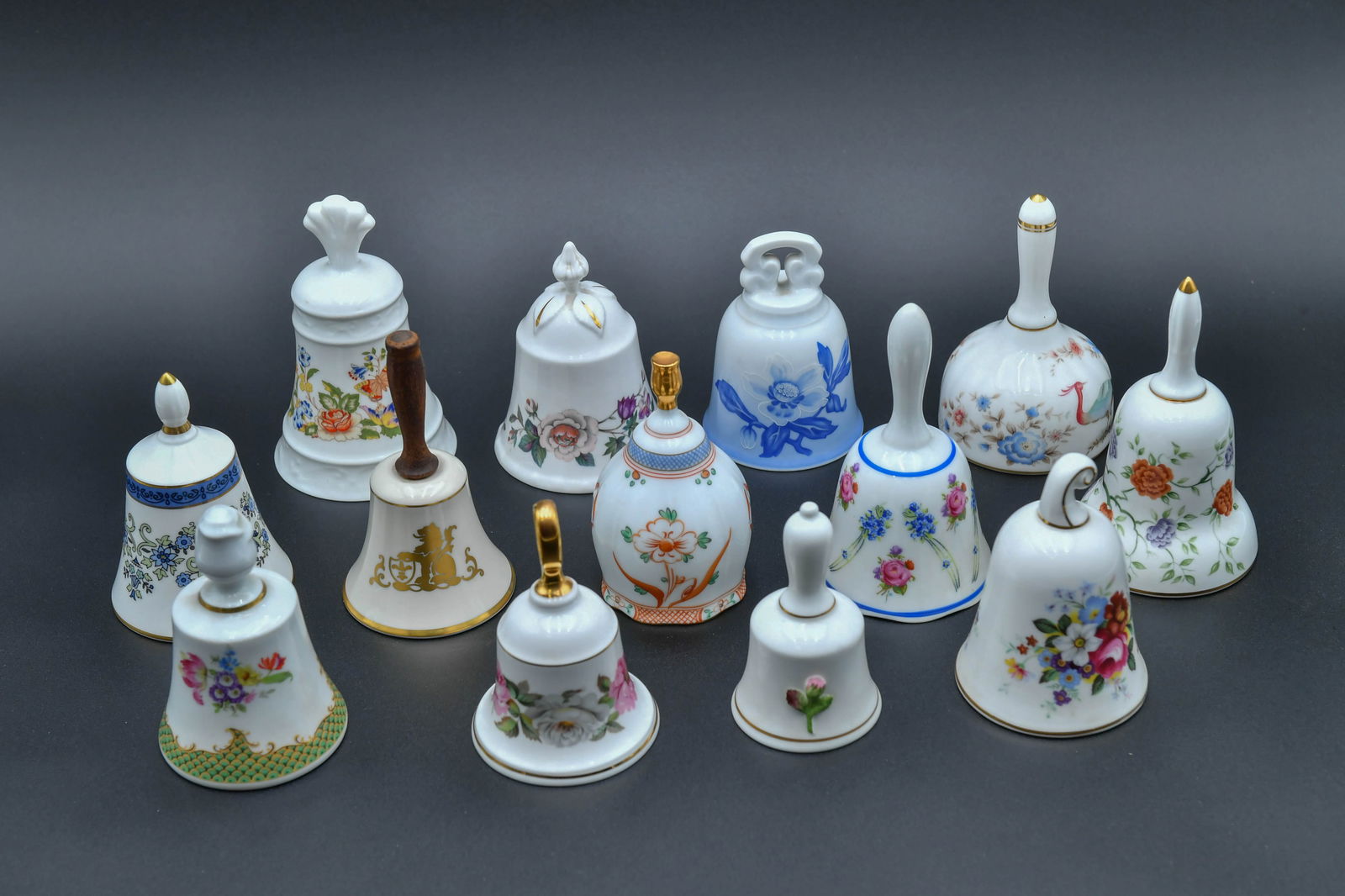 Lot of 13 Vintage The Danbury Mint "Bells of the World's Great Porcelain Houses "Collection: Lot of 13 Vintage The Danbury Mint "Bells of the World's Great Porcelain Houses "Collection. 1)Bing & Grondahl (B&G) blue & white porcelain bell, 4"H x 3"W; 2)Royal Grafton Danbury Mint fine bone chin