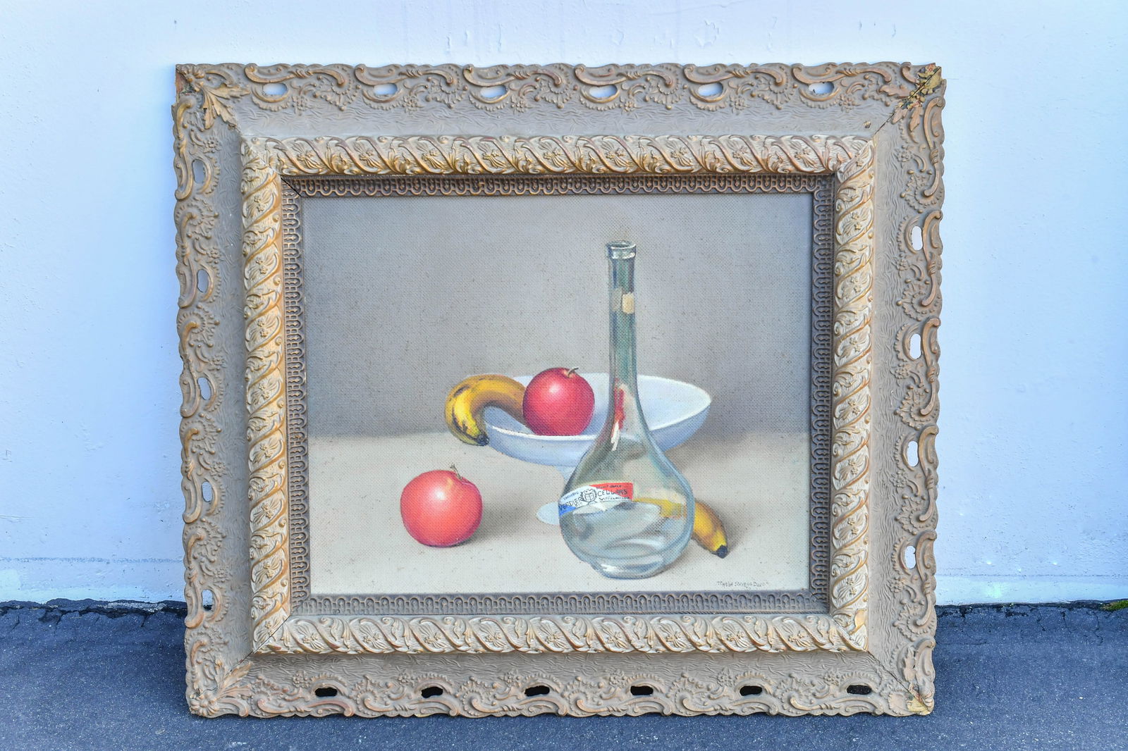 Framed Vintage Still Life Oil Painting w/Fruit & Bottle, Artist "Myrle Dodd" Signature, 1956: Framed Vintage Still Life Oil Painting w/Fruit & Bottle, Artist "Myrle Dodd" Signature. Frame size 29"1/2L x 26"H, and three corners with light damage , (Stand Not Included)