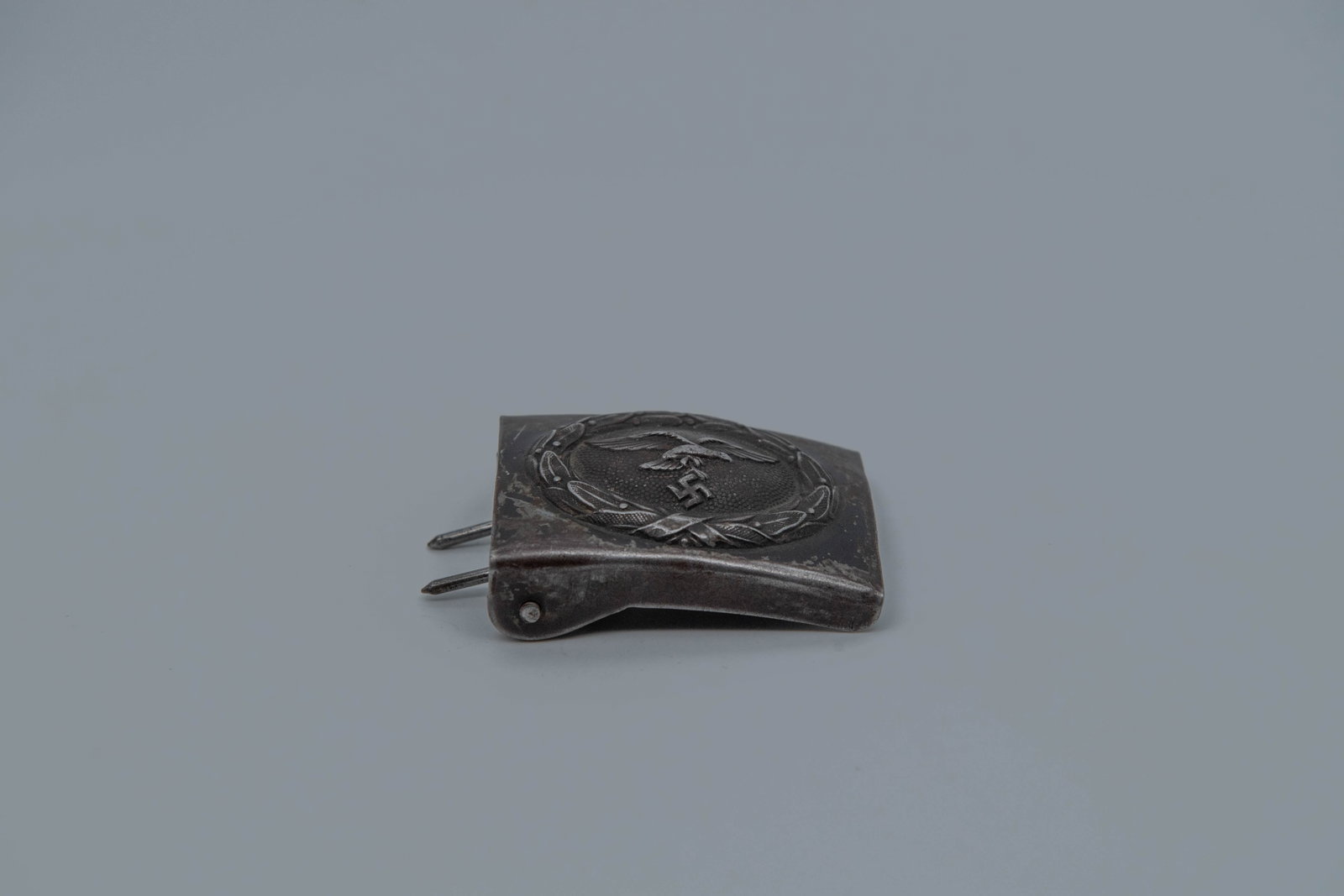 Vintage German WWII Lufwaffe Men's Steel Belt Buckle: Vintage Men's Steel Belt Buckle. This appears to be a World War II-era German Luftwaffe enlisted men's steel belt buckle. 2"1/2 x 2"; Overall in good vintage condition, (Stand Not Included)