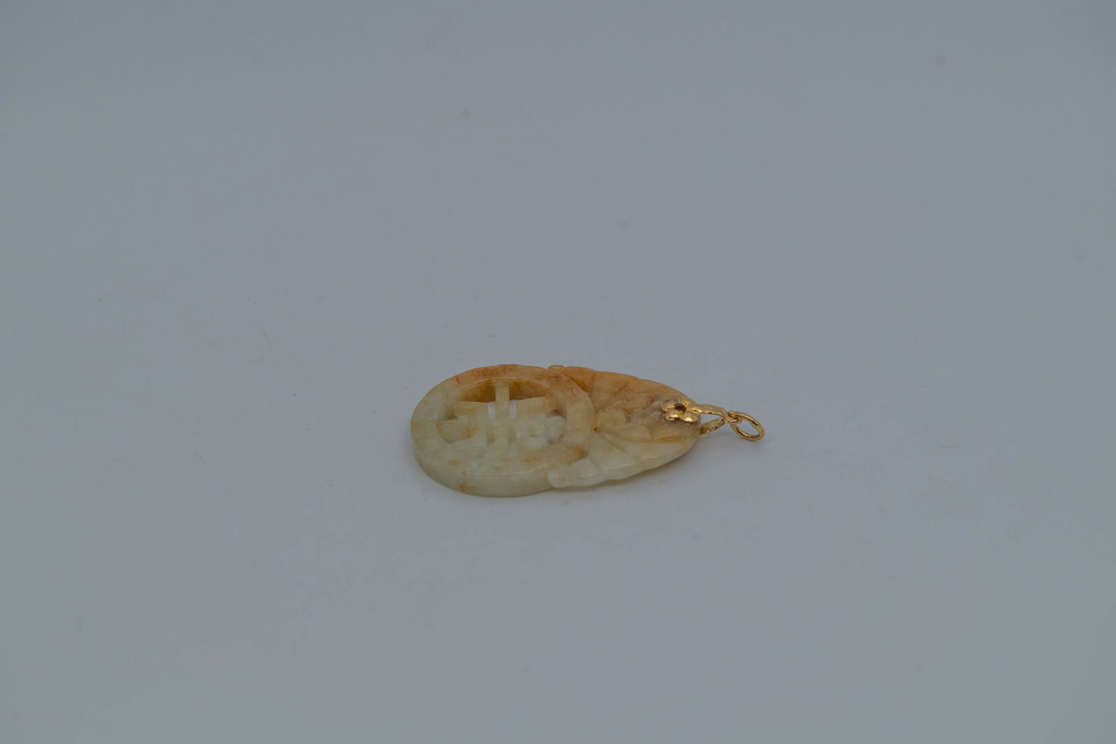 Vintage 14K Yellow Gold w/Large Hand-Carved Jade Pendant: Vintage 14K Yellow Gold w/Large Hand-Carved Jade Pendant. Measures 2" x 1"1/4; Total weight 12.3g; In good condition, (Stand Not Included)