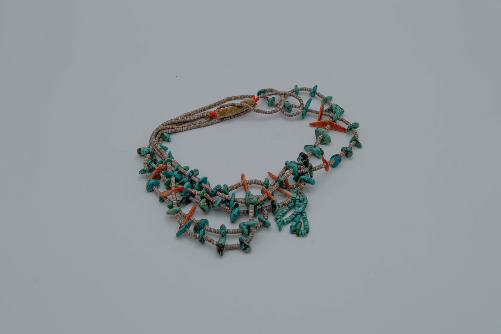 Vintage Native American Santo Domingo Multiple Strands Turquoise, Coral & Shell Fetish Necklace: Vintage Multiple Strands Fetish Necklace. The necklace with turquoise and coral stones strung on hand-drilled heishi beads. Measures approx. 14"L; In good vintage condition