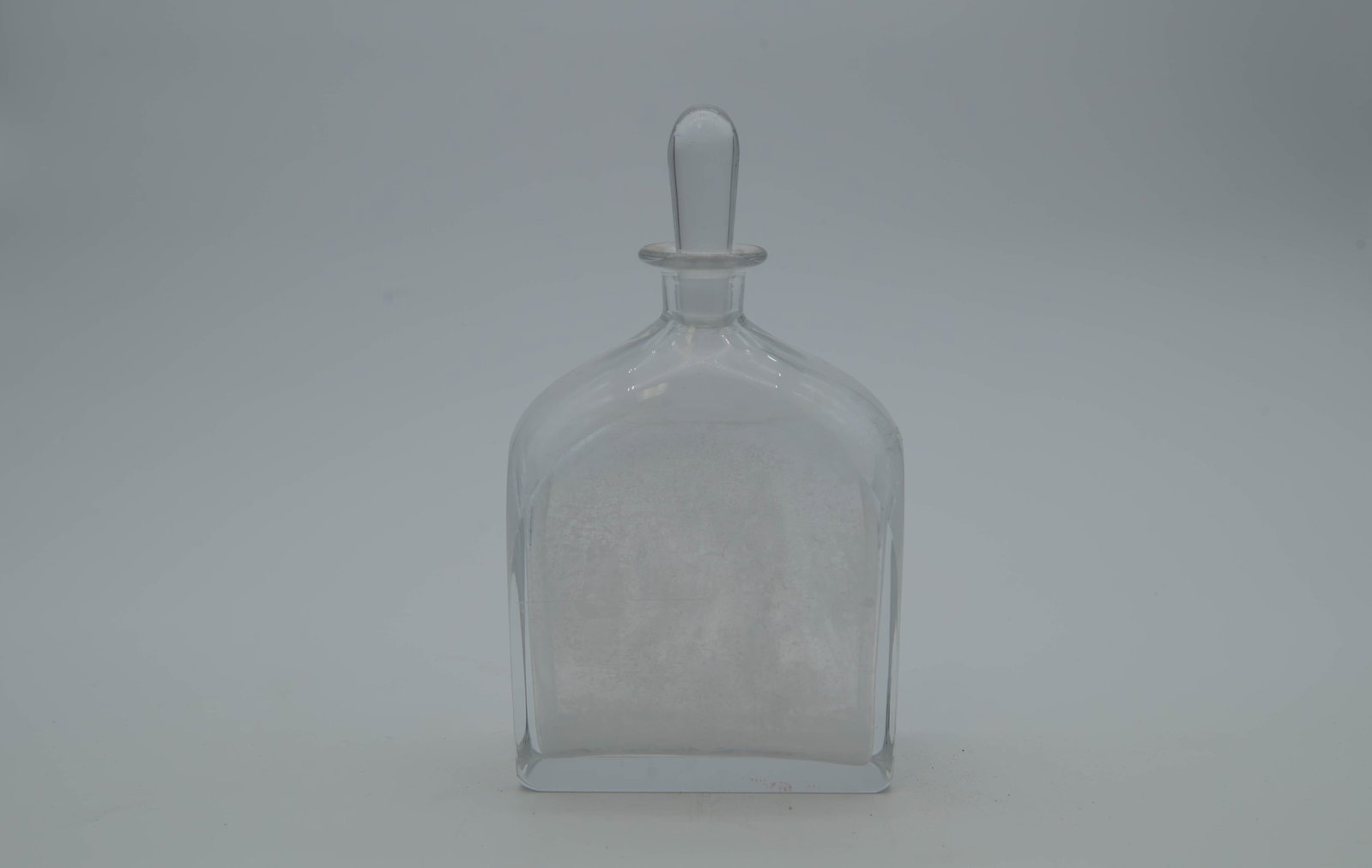 Vintage Orrefors Signed Etching/Engraving Glass Decanter, N 1795 w/Stopper: Vintage Orrefors Signed Etching/Engraving Glass Decanter, N 1795 w/Stopper. Two side with high polish relief and opaque etched sailor and sailboat scene. 7"1/4H x 5"1/4W x 2"1/4D; In good overall cond