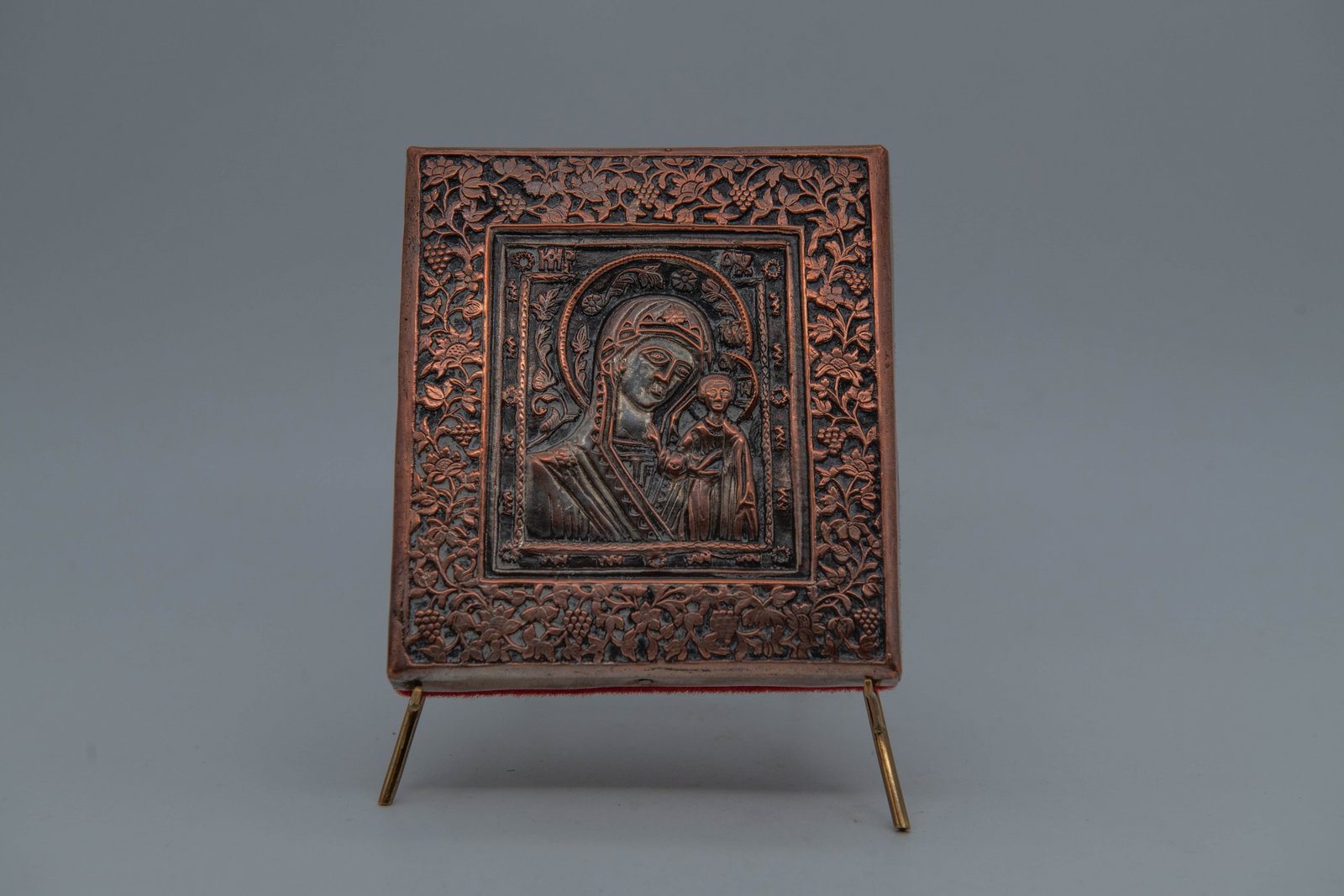 Vintage Russian Orthodox Copper Relief Icon "The Virgin of Kazan" w/Gold Metal Display Stand: Vintage Russian Orthodox Copper Relief Icon "The Virgin of Kazan" w/Gold Metal Display Stand. Size: 4" x 4"1/2; In good condition
