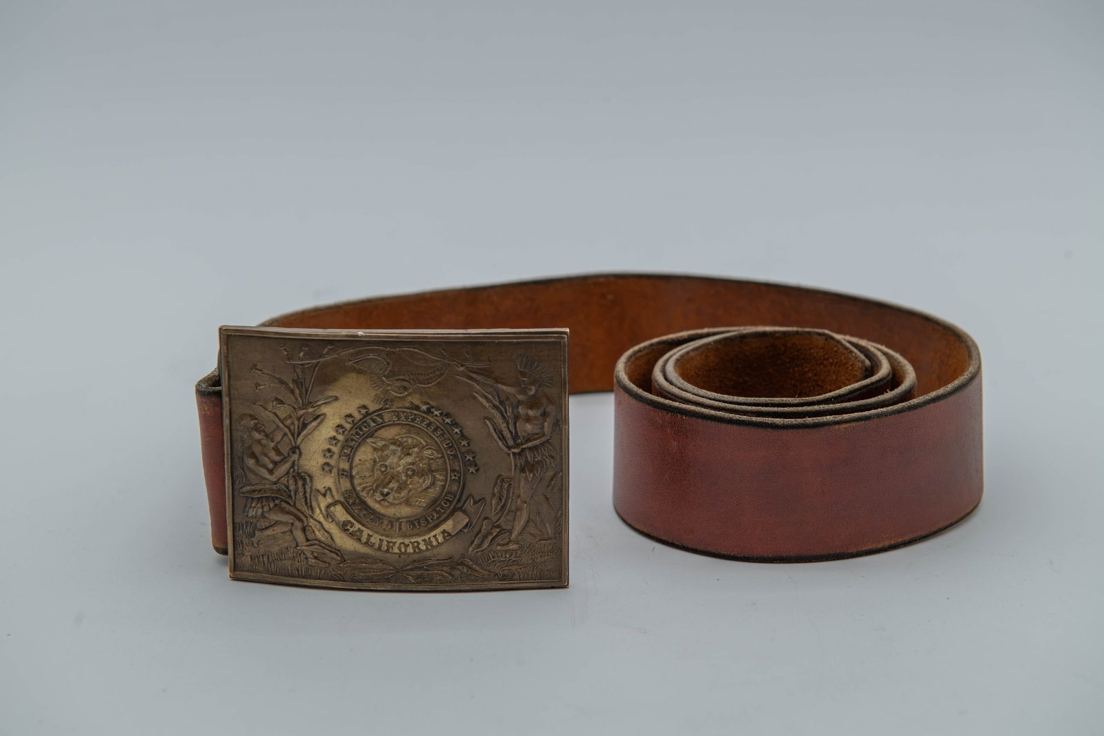 Tiffany & Co. Vintage American Express Company Brass Buckle & Belt, Made in London, England: Tiffany & Co. Vintage American Express Company Safety Dispatch Solid Brass Buckle & Belt. This vintage solid brass buckle associated with Tiffany & Co. London England. Buckle size 4" x 3"; Cowhide bel