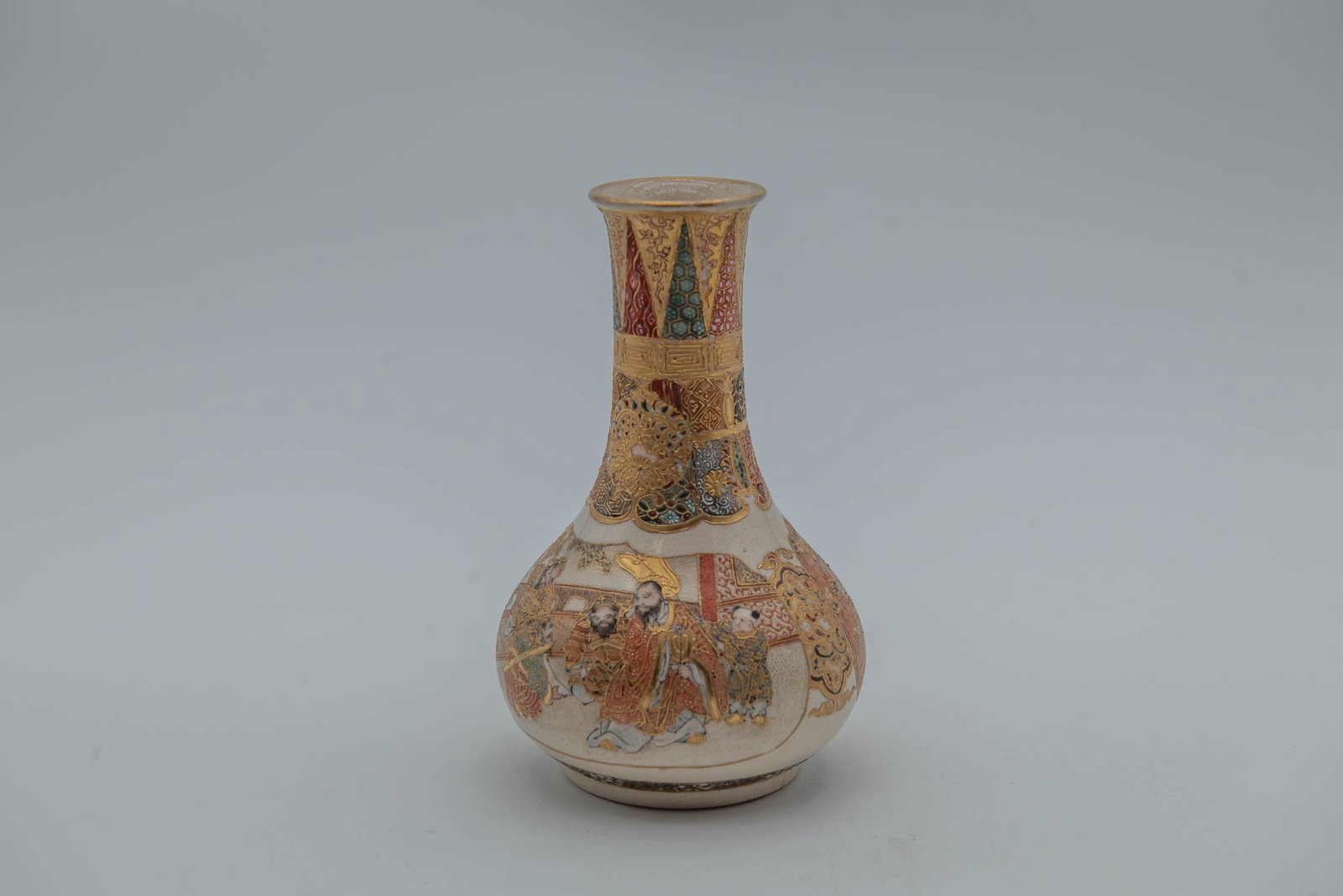 Finely Antique Japanese Crackled Glaze Hand-Painted Figures Satsuma Vase: Finely Antique Japanese Crackled Glaze Hand-Painted Figures Satsuma Vase. The vase is adorned with intricate hand-painted figures, sumptuous gilding, and colorful raised enamels, often depicting scene