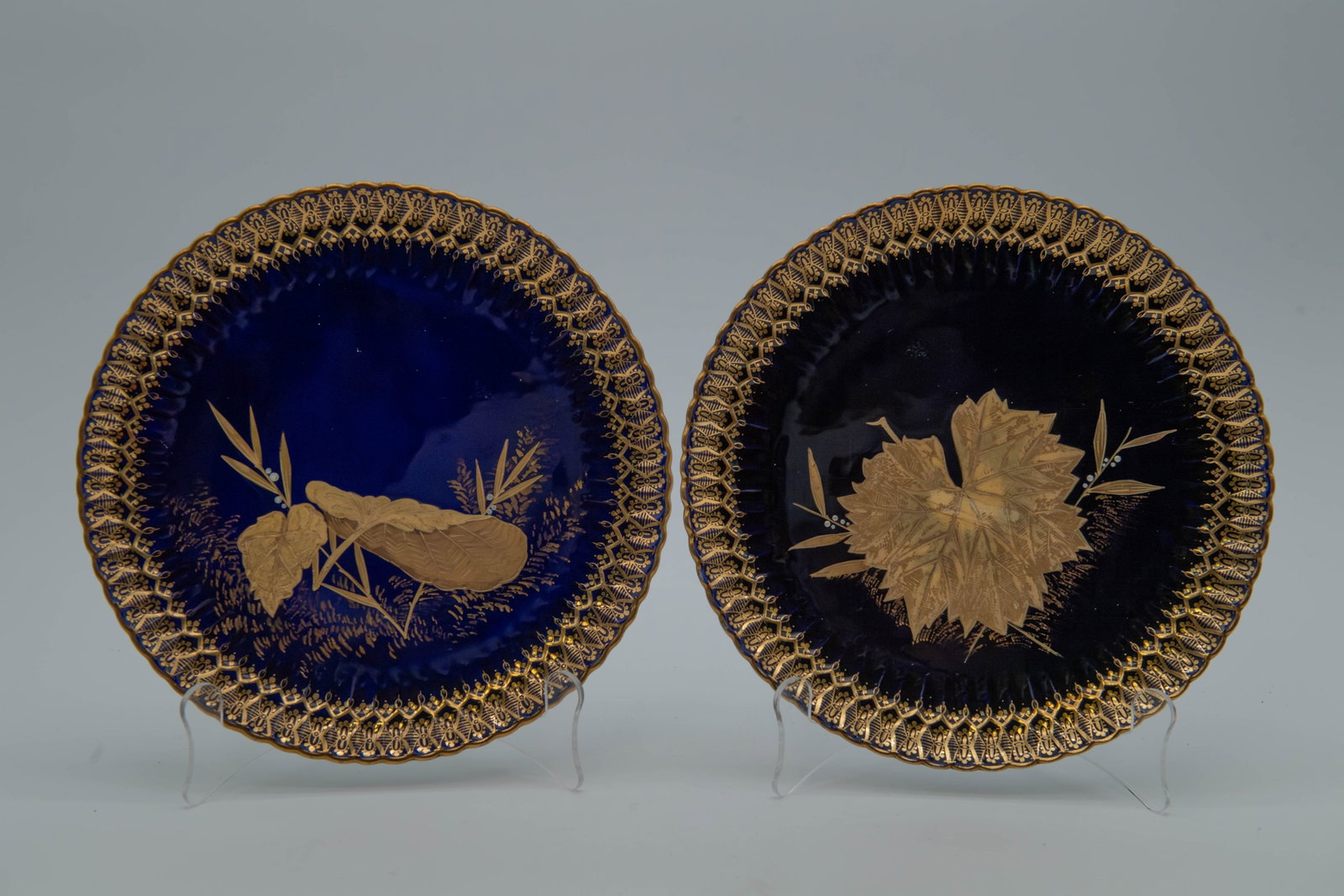Marvellous Antique Pair of W.T. Copeland Cobalt Blue & Gold Porcelain Plates, Circa 1833: Marvellous Antique Pair of W.T. Copeland Cobalt Blue & Gold Porcelain Plates, Circa 1833. Fine cobalt blue ground with raised gilt leaf ornamentation and a scalloped edge. Dimensions 8"3/4 Diameter. I