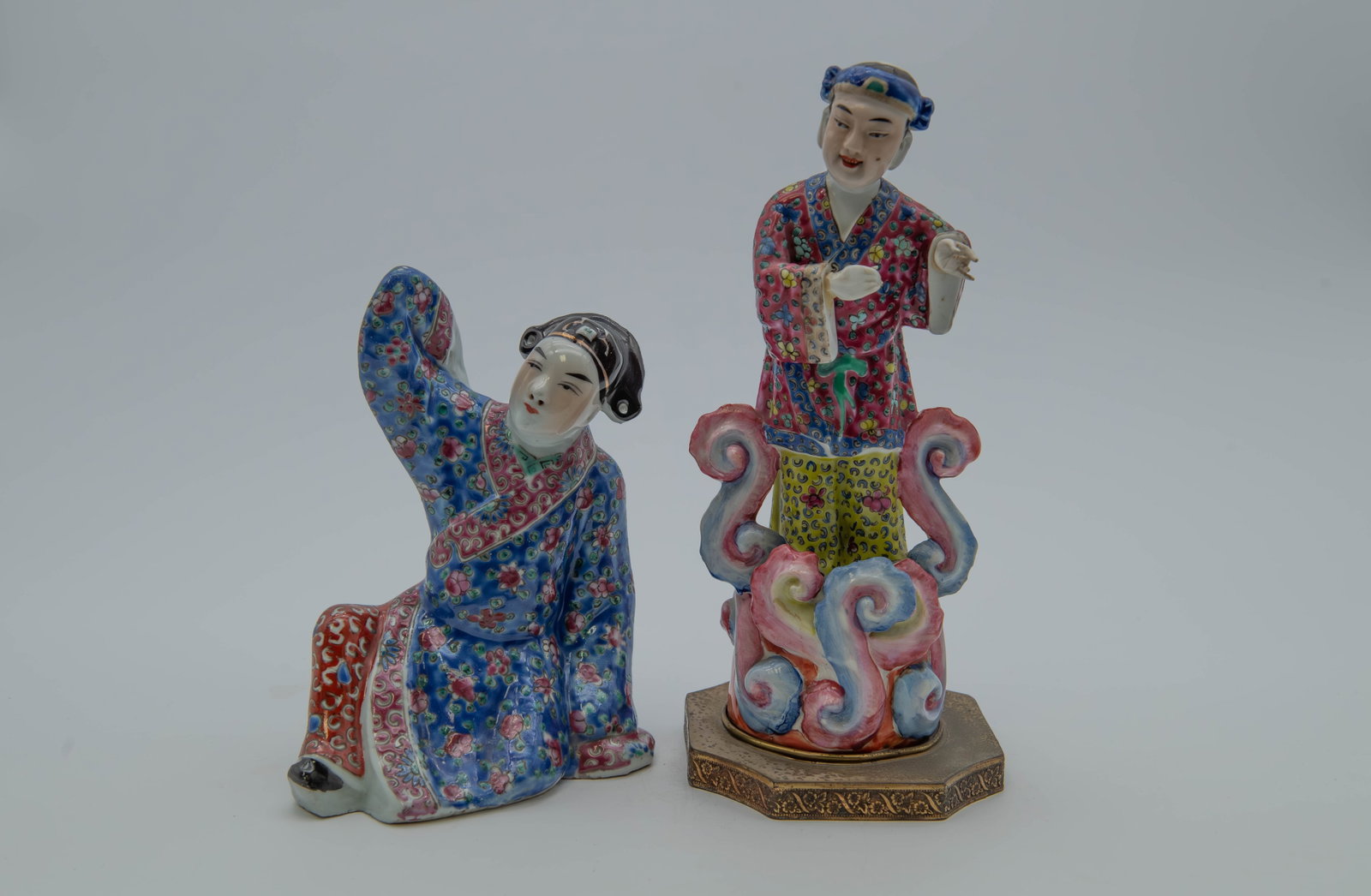 Lot of 2 Antique Chinese Famille Rose Porcelain Figurine Statues: Lot of 2 Antique Chinese Famille Rose Porcelain Figurine Statues. 1)Antique Chinese Famille Rose Porcelain Sitting Figurine Statue. Measures 7"1/2H x 5"1/2L x 3"1/2W, Overall in good condition. 2)Anti