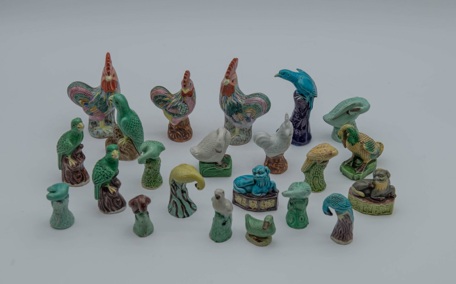 Group of 22 Vintage Chinese Miniature Animal Figures Porcelain Sculptures: Group of 22 Vintage Chinese Miniature Animal Figures Porcelain Sculptures. Measures approx. 1"1/2 x 1"1/2 to 2"3/4 x 4"1/2; Overall in good condition, with only three pieces showing minor chips or dam