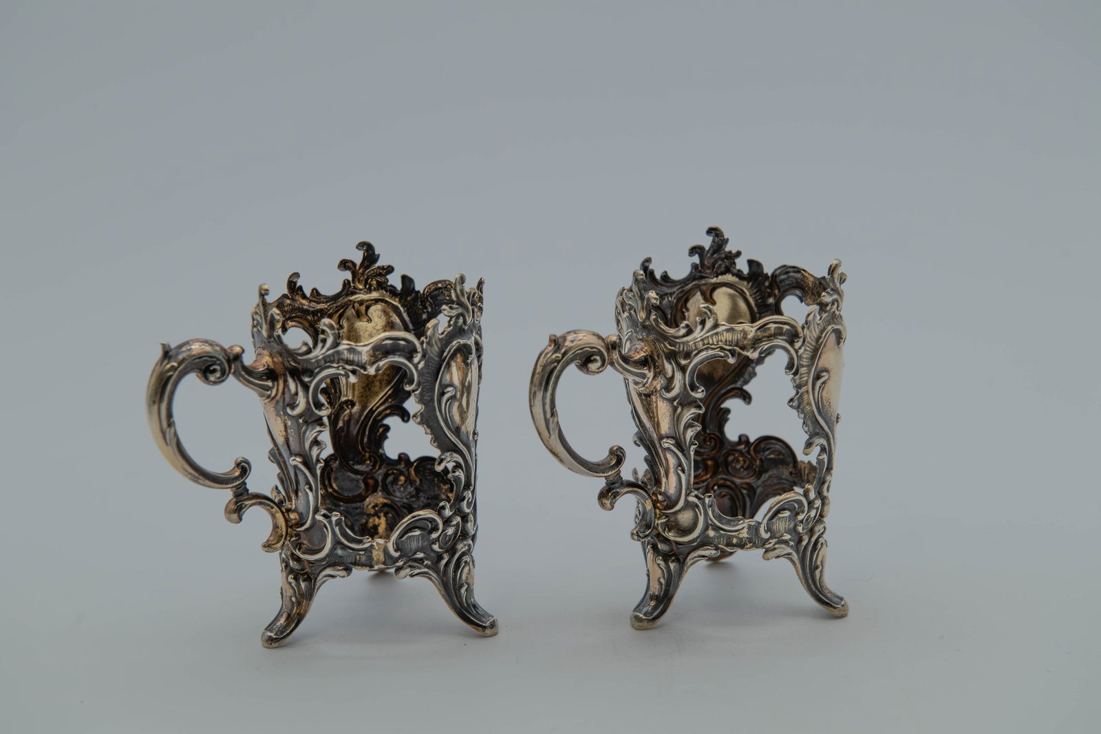 Pair of Vintage/Antique Ornate Silver Cup Holders w/Scrolled Feet & Floral Motifs w/Mark "800": Pair of Vintage/Antique Ornate Silver Cup Holders w/Scrolled Feet & Floral Motifs w/Mark "800" Silver. Size 4"H x 2"1/2W; Total weight 95.8g. In good condition