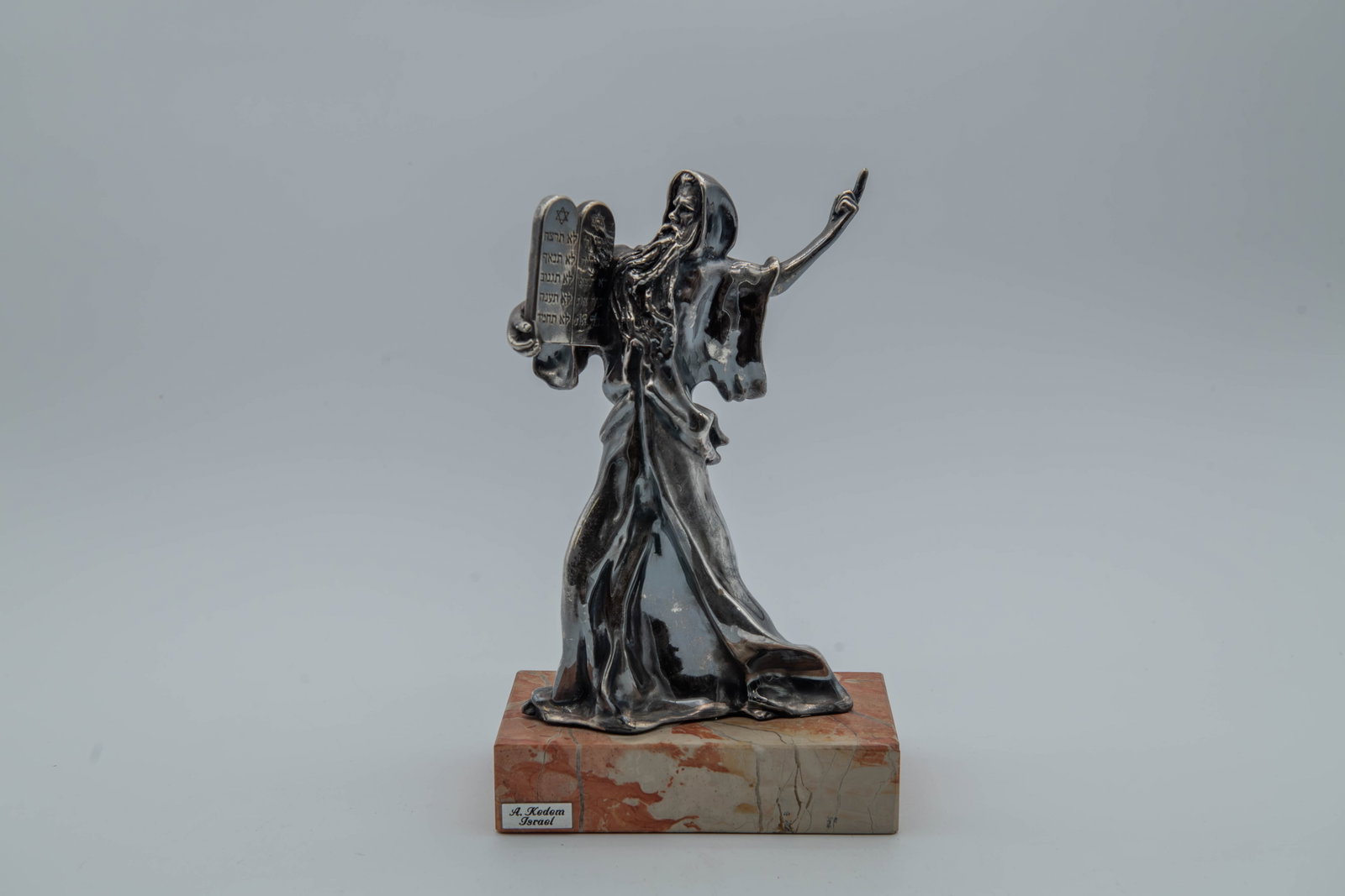 A. Kedem Sterling Silver Moses w/10 Commandments Figurine Sculpture Mounted on Marble Base: A. Kedem Sterling Silver (925 Mark) Moses w/10 Commandments Figurine Sculpture Mounted on Marble Base. Marble bass size 5"1/2L x 3"W x 1"1/4H; The Moses sculpture size 7"1/2H x 4"3/4L x 2"W; Total wei
