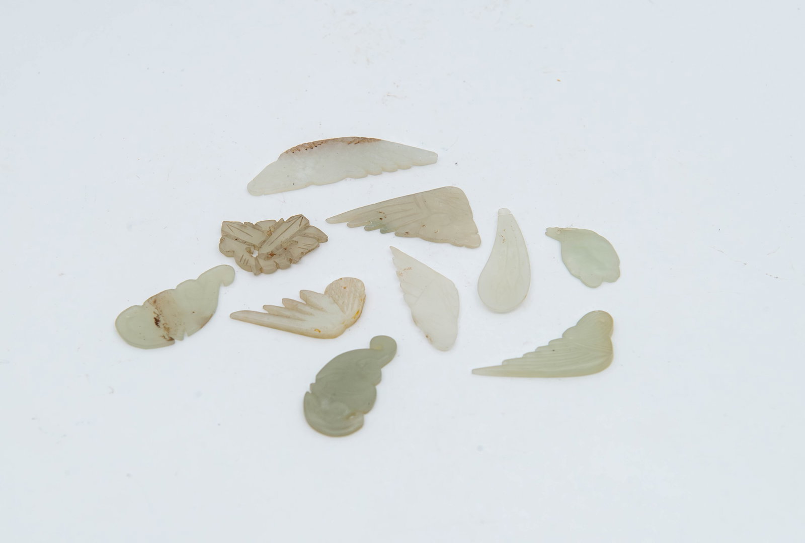 Lot of 10 Old Chinese Jade Carving Pieces: Lot of 10 Old Chinese Jade Carving Pieces. Measures approx. 3/4" x 1/2" to 2"3/4 x 1/2".