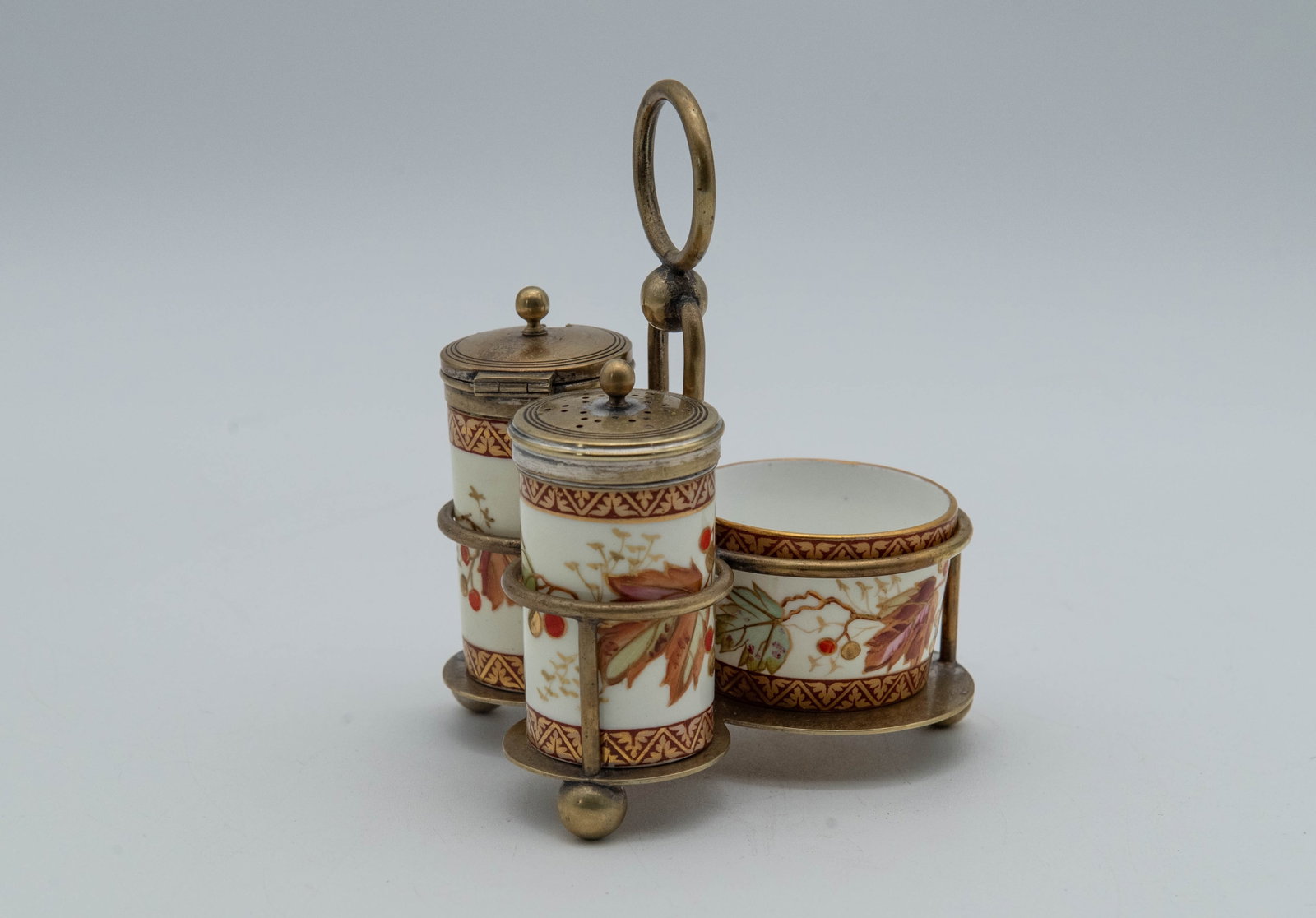 T.W English Imari Style Hand-Painted-Painted Porcelain Condiment Set, Marked: T.W English Imari Style Hand-Painted-Painted Porcelain Condiment Set, Marked. 1)Salt and pepper caddy 2"1/2H x 1"3/8W. 2)Sugar bowl 2"W x 1"1/2H. Overall in good vintage condition