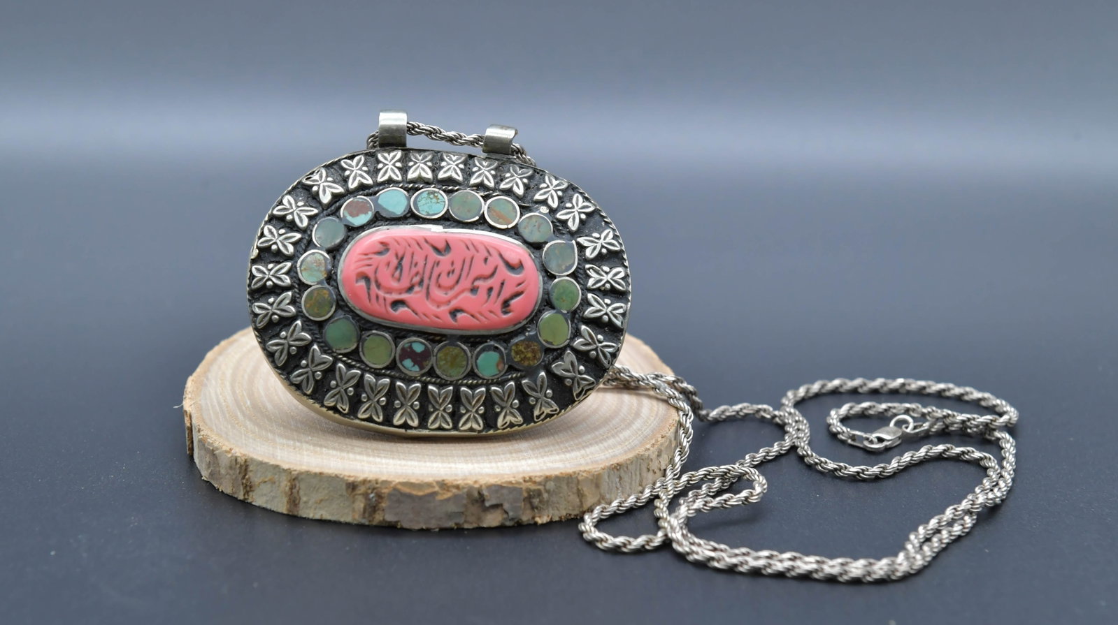 Large Vintage Afghan Tribal Silver Pendent & 925 Sterling Chain: Large Vintage Afghan Tribal Silver Pendent & 925 Sterling Chain. 1)Large silver pendent (Silver tested positive by acid test; purity not verified), size 2"1/2 x 2"; 2)Marked 925 sterling silver chain 