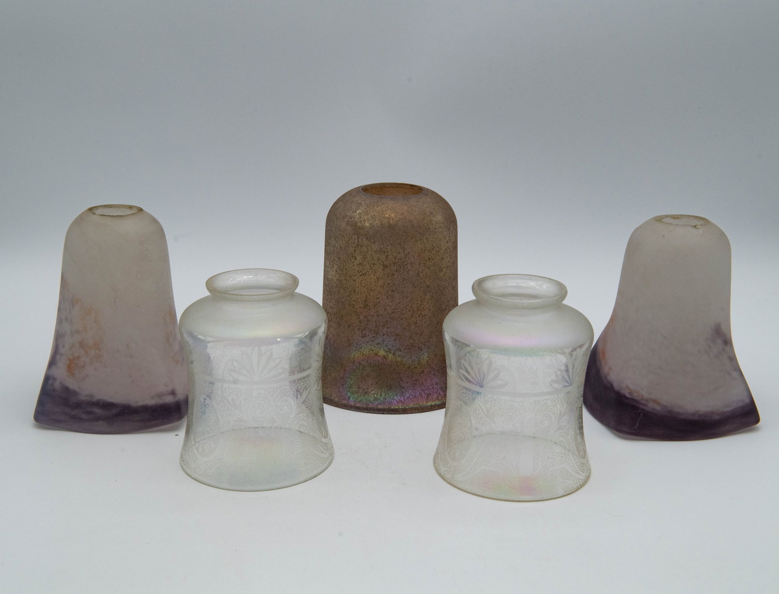 Lot of 5 Vintage Fine Art Glass Shades: Lot of 5 Vintage Fine Art Glass Shades. Measurement: 4"1/2 x 3"3/4 (2pcs); 5"1/4 x 4"1/4 (2pcs Purple frosted glass shades, small chip at the rim); 5"1/2 x 5"1/2. Overall in good vintage condition.