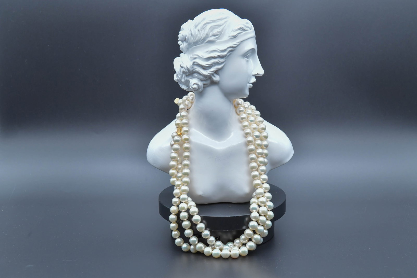 Beautiful Triple Strand Pearl Necklace w/Marked 14K Gold Clasp: Beautiful Triple Strand Pearl Necklace w/Marked 14K Gold Clasp. Length around 16" & 17" & 18", Pearl bead 8.9mm; Perfect condition, (Stand Not Included)
