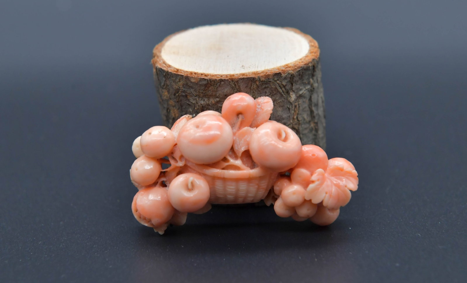 Fine Vintage Handcrafted Natual Angel Skin Coral Fruit Basket Brooch w/Silver Setting: Vintage Handcrafted Natual Angel Skin Coral Grape Cluster & Apple Fruit Basket Brooch. The carving is mounted on a silver (Silver tested positive by acid test; purity not verified) Setting. Carving ha