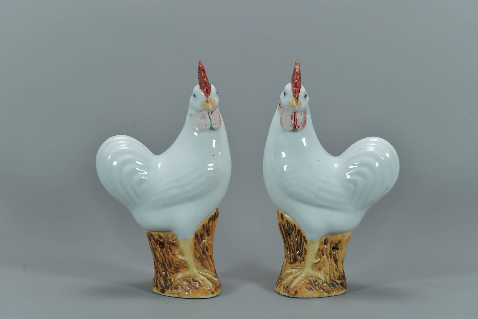 Pair of Antique Chinese Export Porcelain Rooster Figurines: Pair of Antique Chinese Export Porcelain Rooster Figurines. Measures approx. 9"1/2Tall; It's in overall good condition except a rooster's beak is chipped.