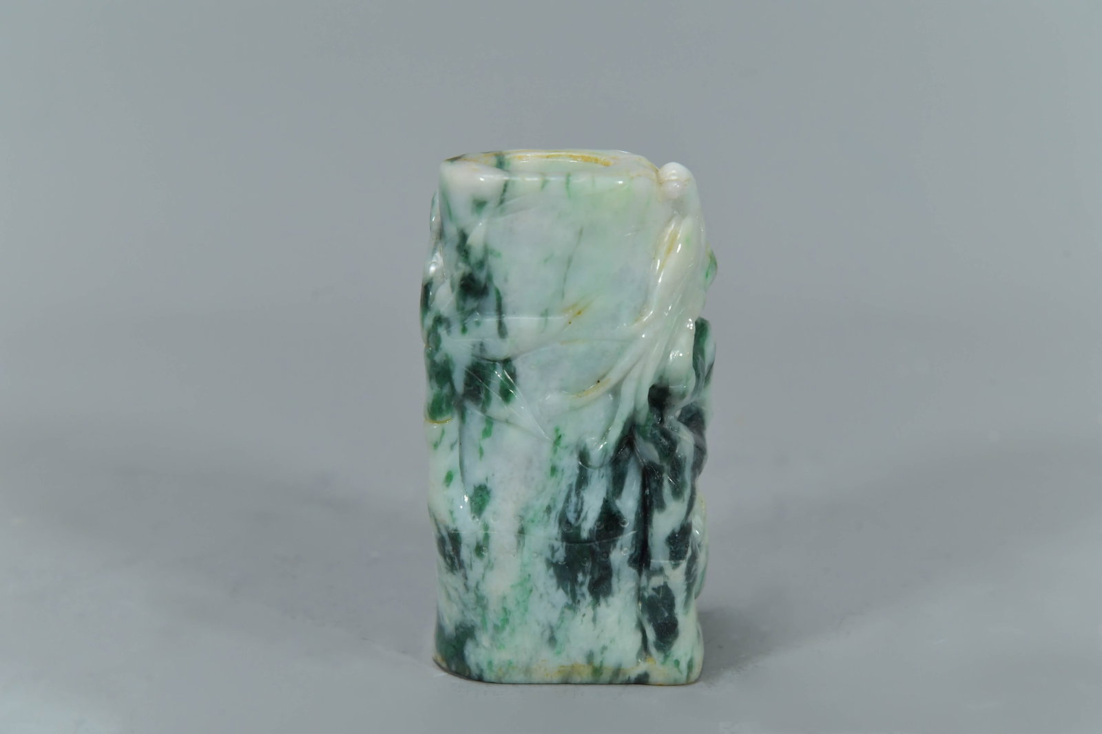 Vintage Chinese Jade Carved Vase w/Flower & Bird Relief: Vintage Chinese Jade Carved Vase w/Flower & Bird Relief. 3"3/4H x 2"W x 1"3/4D; In good condition.