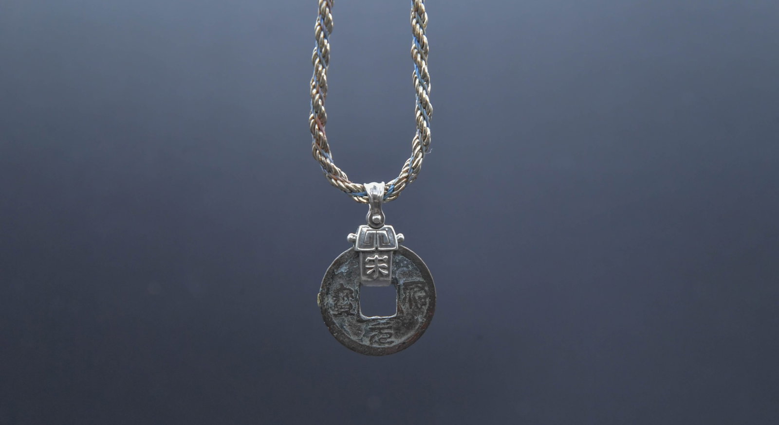 Rare Vintage Marked Sterling Silver Necklace w/Ancient Chinese Coin Pendant: Rare Vintage Marked Sterling Silver Necklace w/Ancient Chinese Coin Pendant. Marked sterling silver chain length 18"; Pendant diameter 1"; Total weight 20.3g; In good condition, (Stand Not Included)