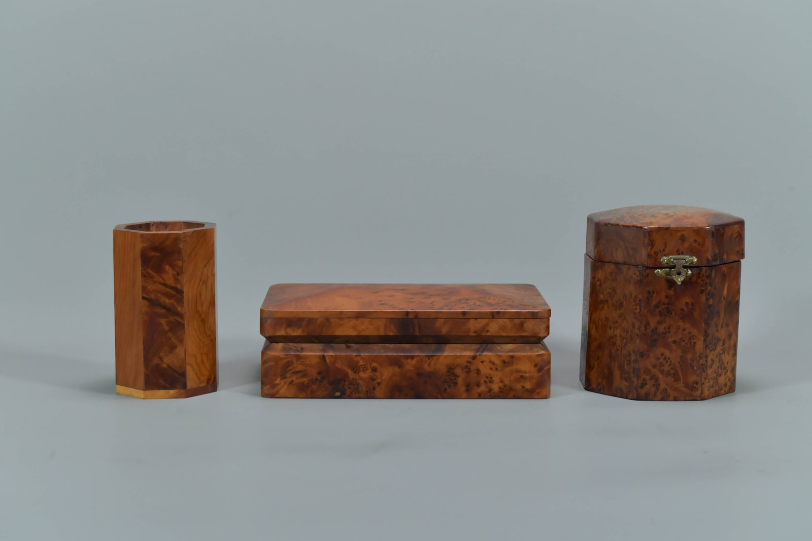 Lot of 3 Vintage Handmade Burl Wood Boxes: Lot of 3 Vintage Handmade Burl Wood Boxes. A rectangle cigars box 8"L x 4"3/4W x 2"1/2H; A octagonal hinged cigars box 4"1/2W x 4"3/4H; A small octagonal brush pot 3"W x 4"1/2H; In good condition