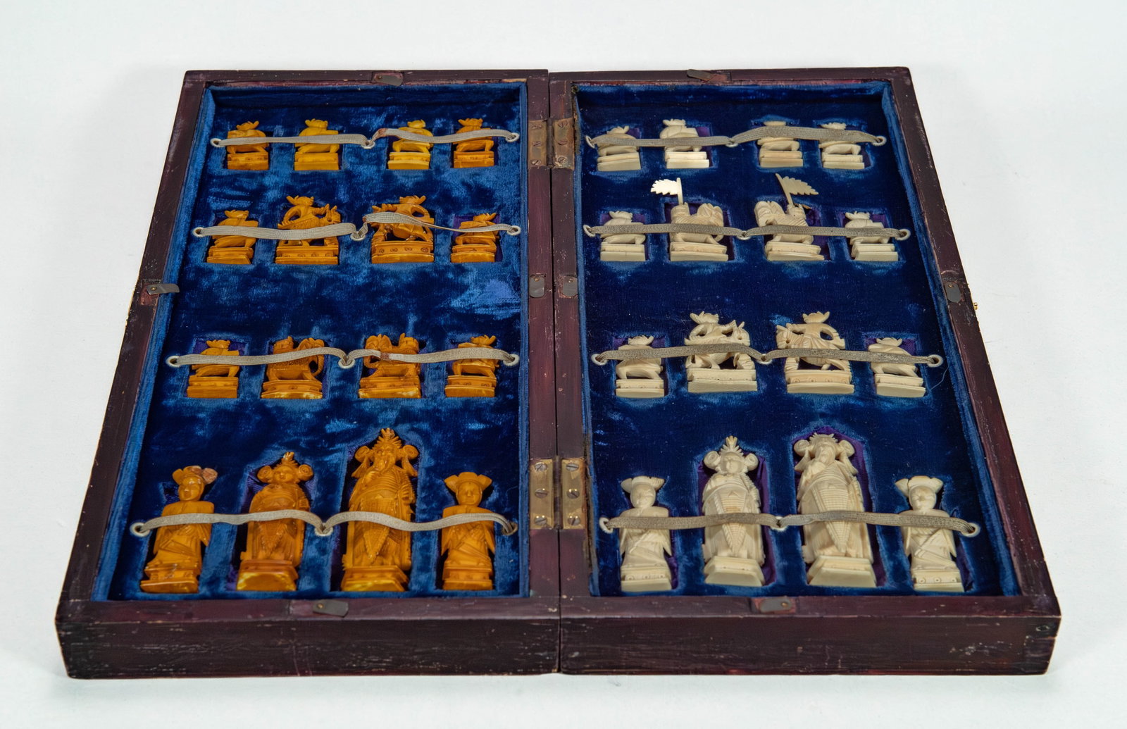 Vintage Chinese Hand-Carved 32 Pieces Chess Set: Vintage Chinese Hand-Carved 32 Pieces Chess Set. A wooden case size 14"1/2 x 7" x 2"1/2. In good vintage condition.