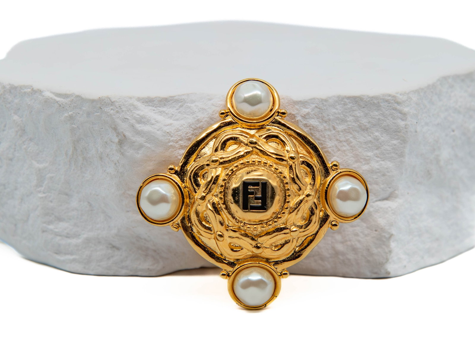 Vintage Marked Fendi Gold-Tone Logo Brooch w/Faux Pearls: Vintage Marked Fendi Gold-Tone Logo Brooch w/Faux Pearls. The reverse bears a clear "FENDI" mark. Overall presents well with minor wear consistent with age and use. (Authenticity has not been independ