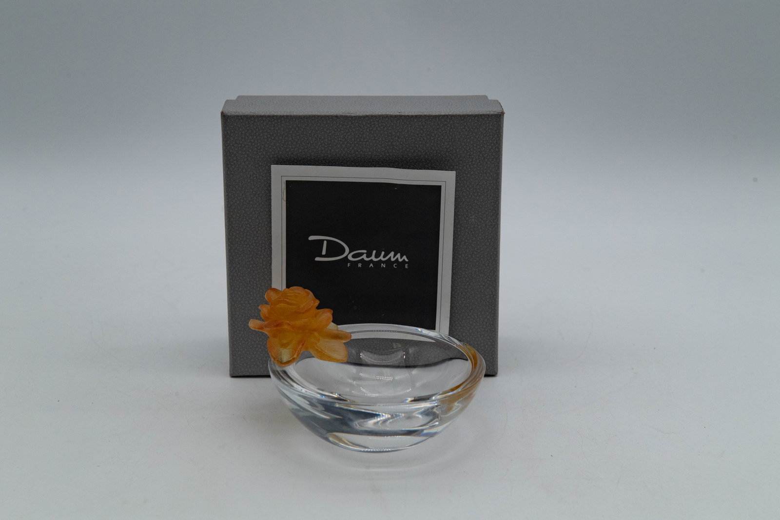 Vintage Amber-Colored "Coupelle Ronde Roses" Crystal Bowl w/Etched "Daum France": Vintage Amber-Colored "Coupelle Ronde Roses" Crystal Bowl w/Etched "Daum France" w/ Box. Measures approx. 4" x 2"1/2. Overall in good condition. (Stand Not Included)