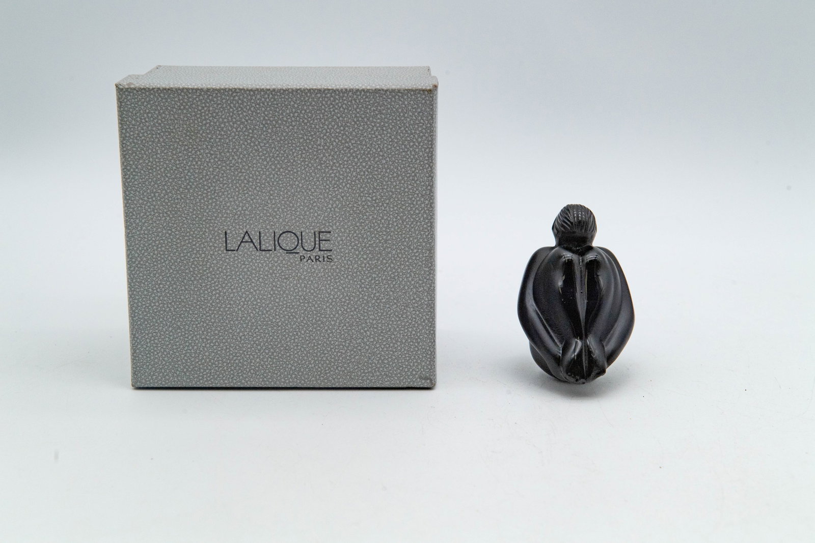 Vintage Black Crystal Nude Figure Sculpture w/Etched "Lalique France": Vintage Black Crystal Nude Figure Sculpture w/Etched "Lalique France" w/Box. Measures approx. 3"1/4H x 2"1/4W x 1"3/4D. Overall in good condition, with minor expected wear consistent with age. There i