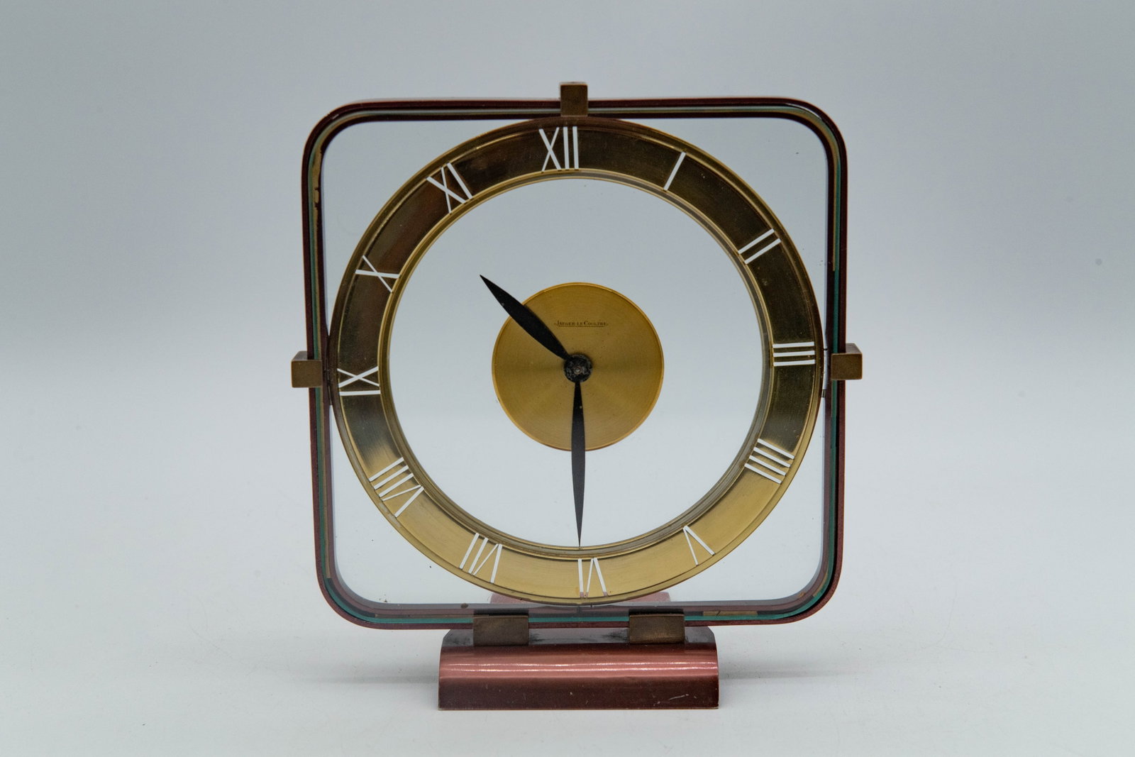 Vintage Jaeger-LeCoultre 8-Day Square Mechanical Desk Clock w/Gold Brass Dial & Frame: Vintage Jaeger-LeCoultre 8-Day Square Mechanical Desk Clock w/Gold Brass Dial & Frame. Measures 7"1/2 x 7" x 3"1/2. Overall in good vintage condition, the brass case shows age-related tarnishing and p