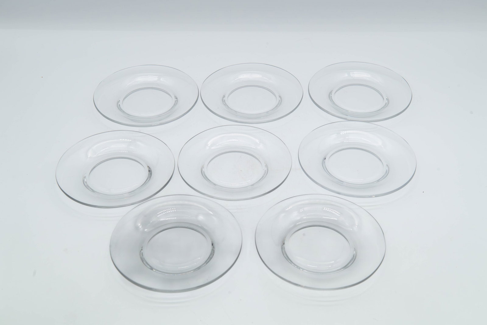 Lot of 8 Vintage Marked VSL Clear Pressed Crystal-Glass Plates: Lot of 8 Vintage Marked VSL Clear Pressed Crystal-Glass Plates. Cast glass with high crystal content for a bright shine and heavy feel. Overall in good vintage condition with minor wear consistent wit