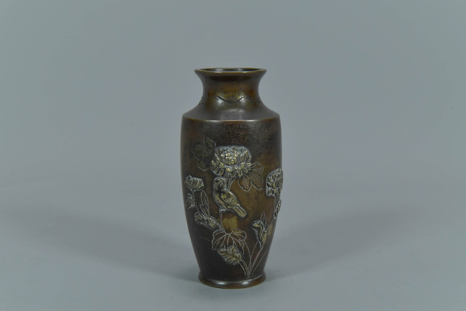 Antique Meiji Period Japanese Bronze & Silver Carving Details Vase w/Relief Bird & Chrysanthemum: Antique Meiji Period Japanese Bronze & Silver Carving Detailing Vase w/Relief Bird & Chrysanthemum Flowers. Tall 5", In good condition, (Stand Not Included)