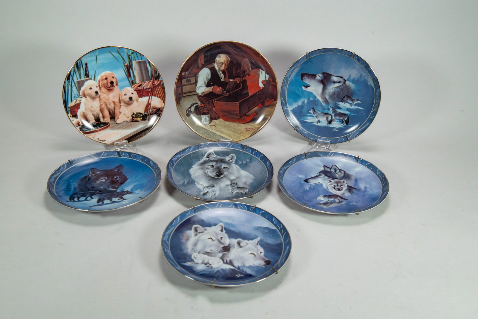 Group of 7 Collection Plates: Group of 7 Collection Plates. 1)Lot of 5 Bradford Exchange collector plate "Spirit of the Wilderness" series, Artist: Eddie LePage. Diameter 8"1/4. 2)A collector's plate is part of the "Reel Pals" ser