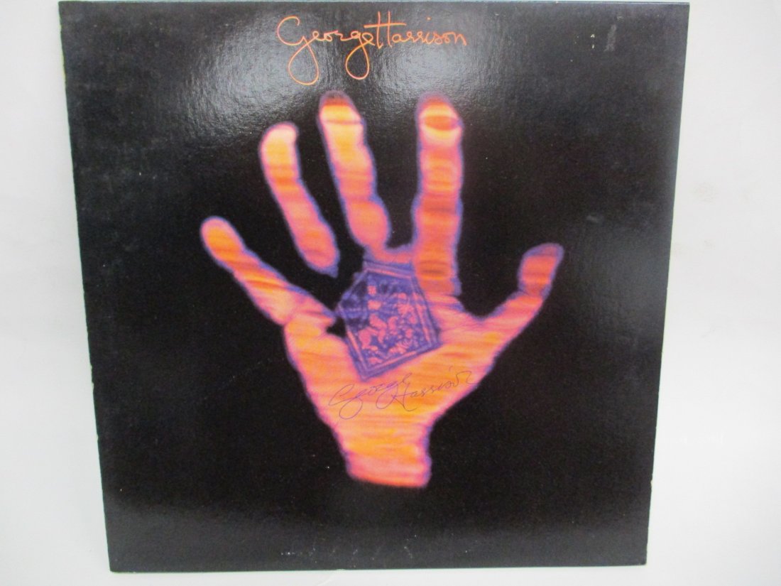 Spiritual Harmony: George Harrison Signed 'Living in the Material World' Album Cover w/COA: Spiritual Harmony: George Harrison Signed 'Living in the Material World' Album Cover.Immerse yourself in the ethereal sounds of George Harrison's solo masterpiece with this rare and extraordinary find